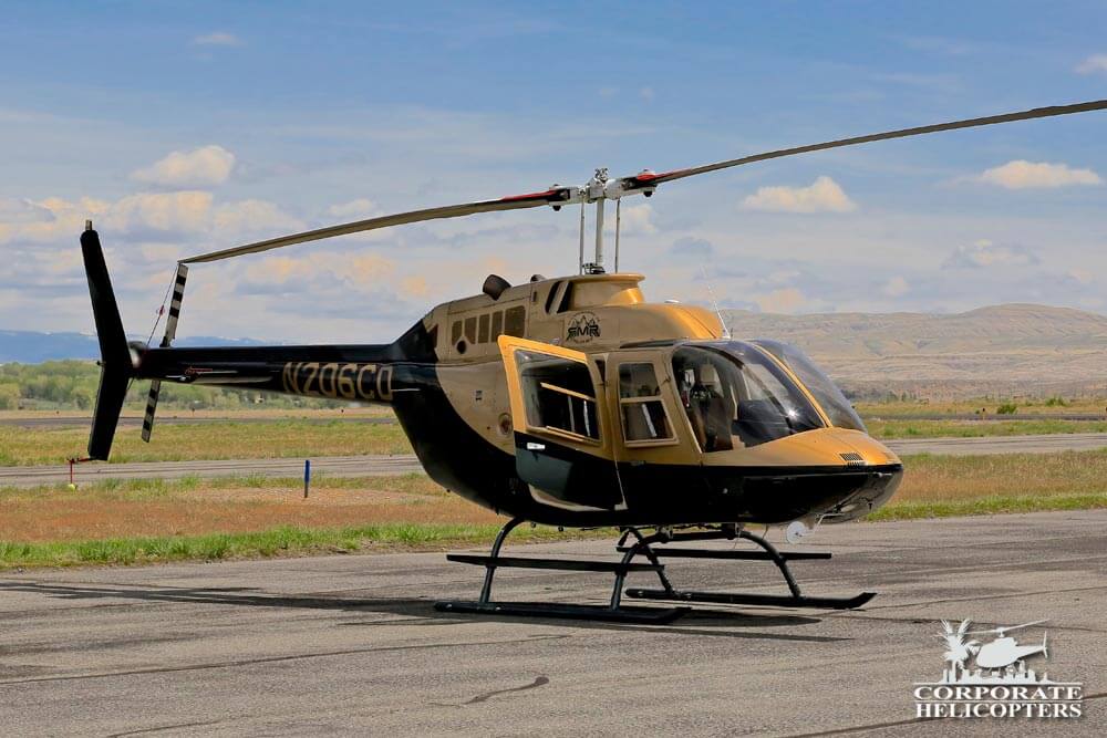 2000 Bell 206B III helicopter on an airfield