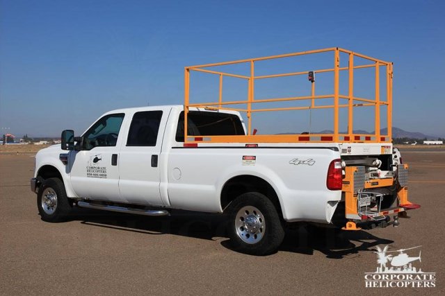 2008 F350XL truck with a retracted Scissor Lift