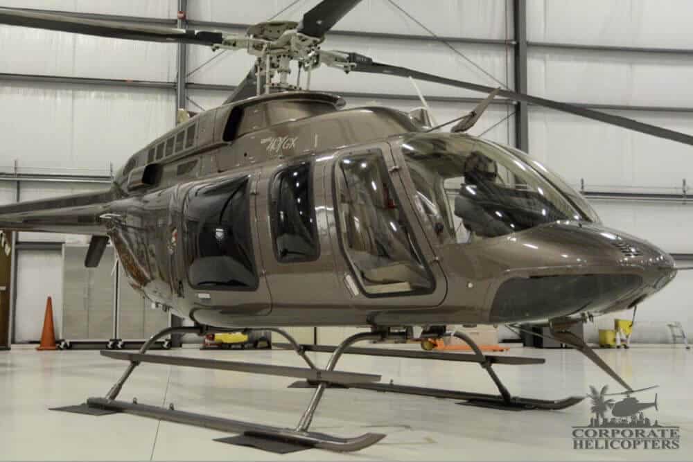 2013 Bell 407GX helicopter in a hangar