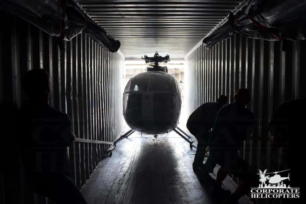 MD500 helicoter is in a shipping container to be shipped overseas