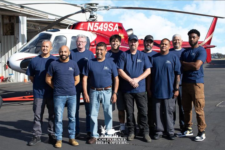 The maintenance staff at Corporate Helicopters poses for a photo