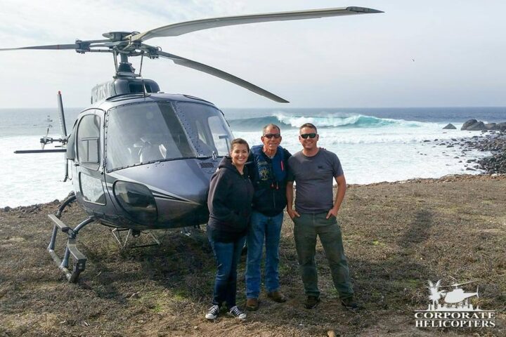 Corporate Helicopters staff in front of helicopter on Todos Santos