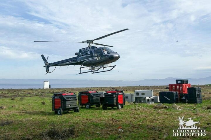 A helicopter landing with supplies on Todos Santos