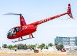 Robinson R44 with the door off, the helicopter has taken off