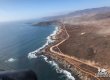 Aerial photo of Baja 400 racers shows a large dustrail