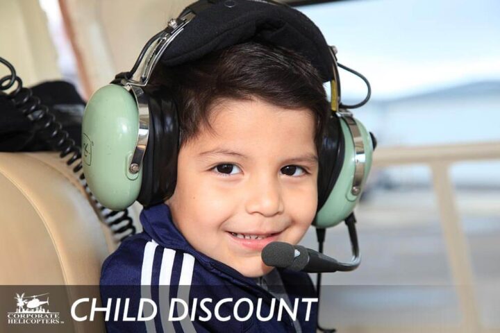 Child inside of a helicopter with headphones on. Text reads: Chidl Discount