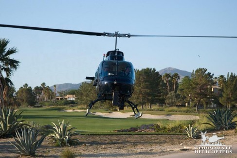 Jetranger helicopter lands next to a golf course in Borrego Springs