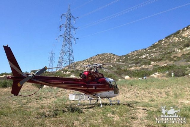 Helicopter landed next to powerlines