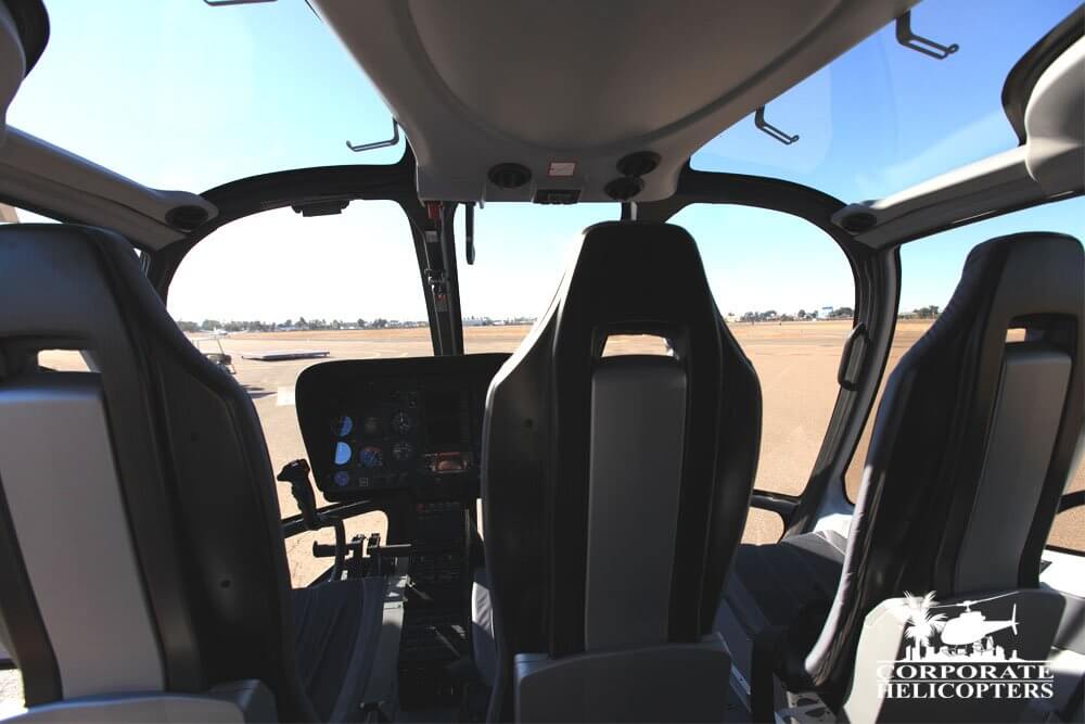 View from the backseat of a 2013 Eurocopter EC130 T2 helicopter