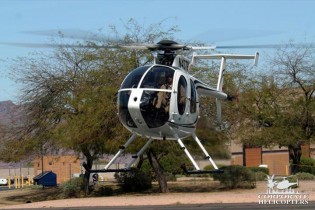 2010 McDonnell Douglas MD 500E helicopter taking off