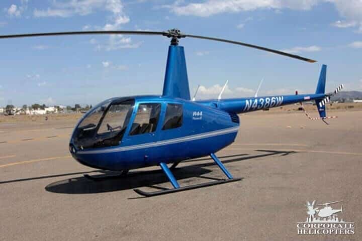 2009 Robinson R44 Raven II helicopter on an airfield