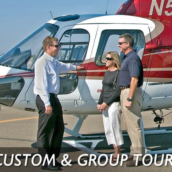 Couple and pilot in front of helicopter. Text reads: Custom & group tours