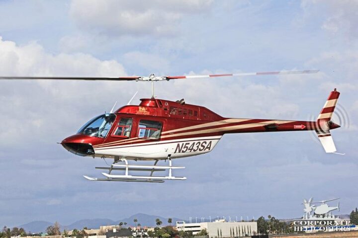 A Bell 206BIII JetRanger helicopter in flight