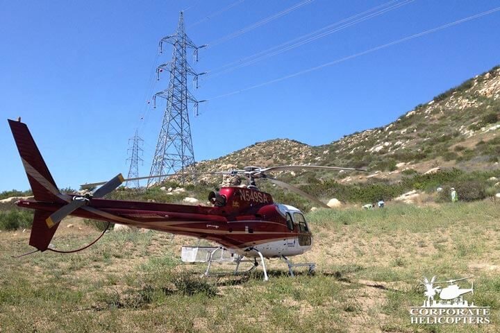 Helicopter landed next to powerlines