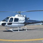 2012 Eurocopter AS350 B3 helicopter landed on an airfield