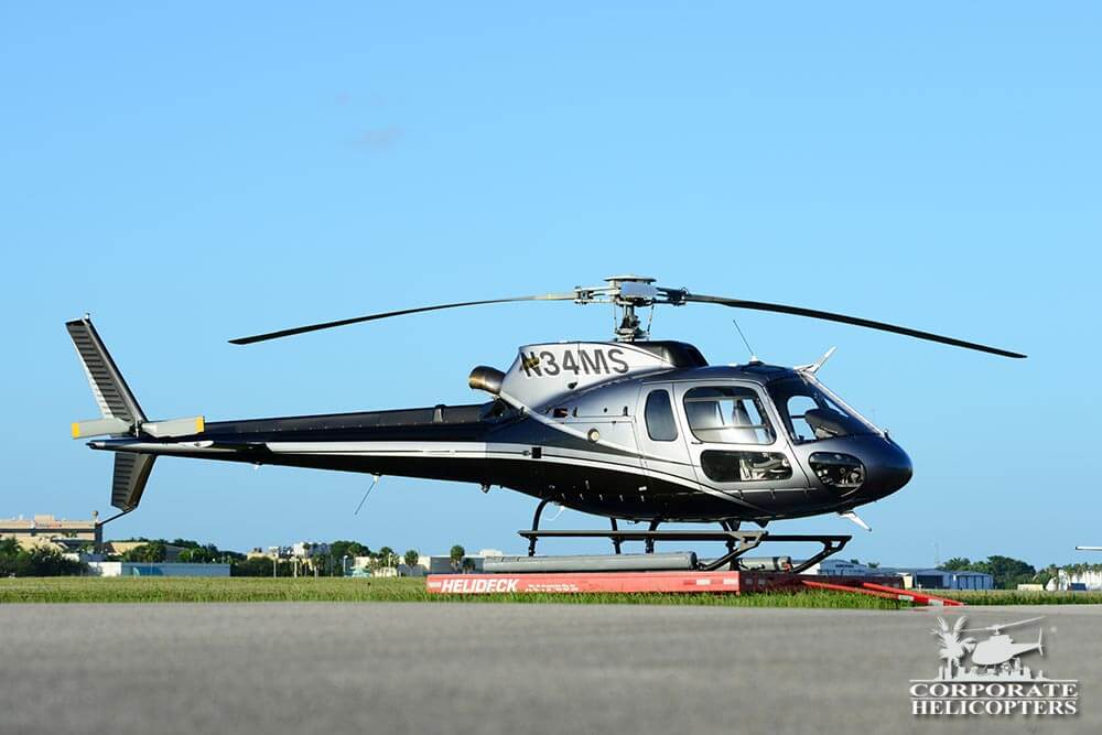 2011 Eurocopter AS350 B2 helicopter landed on an airfield
