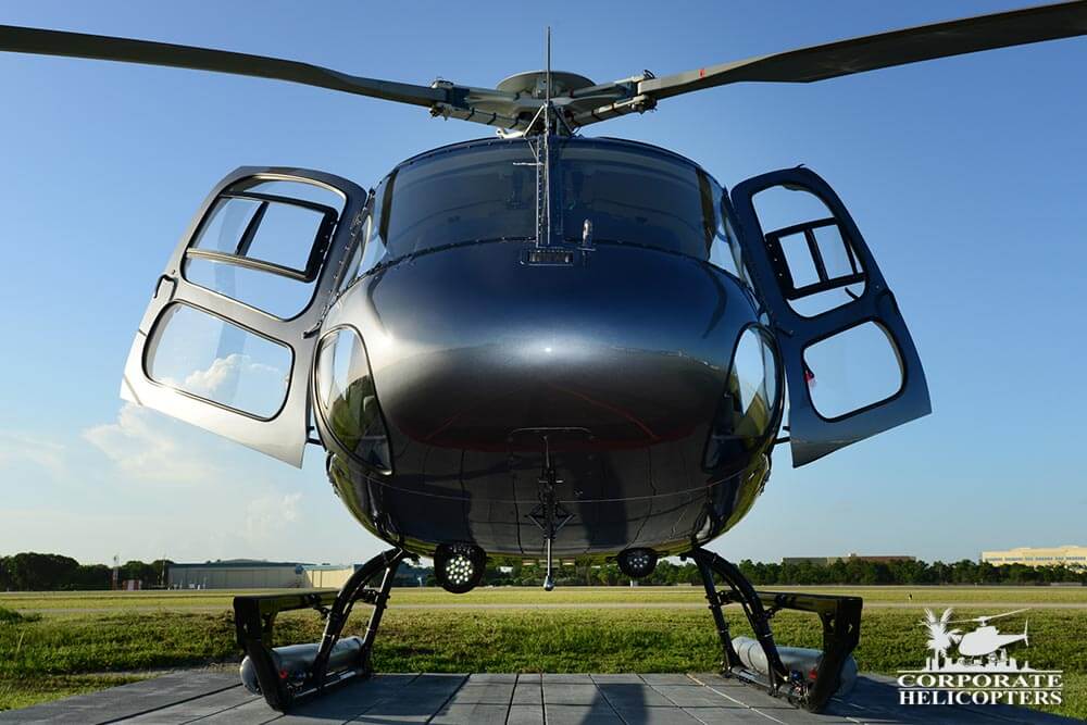 Front view of a 2011 Eurocopter AS350 B2 helicopter with the doors open