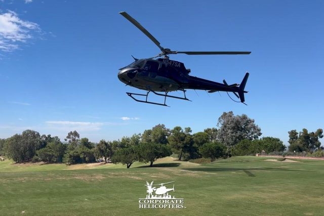 helicopter-golf-course Helicopter taking off from a golf course green