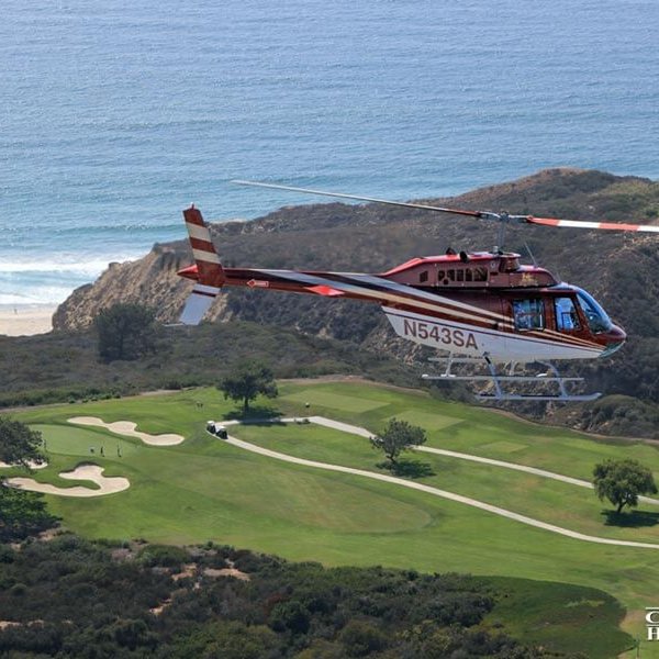 Helicopter flying over Torrey Pines golf course