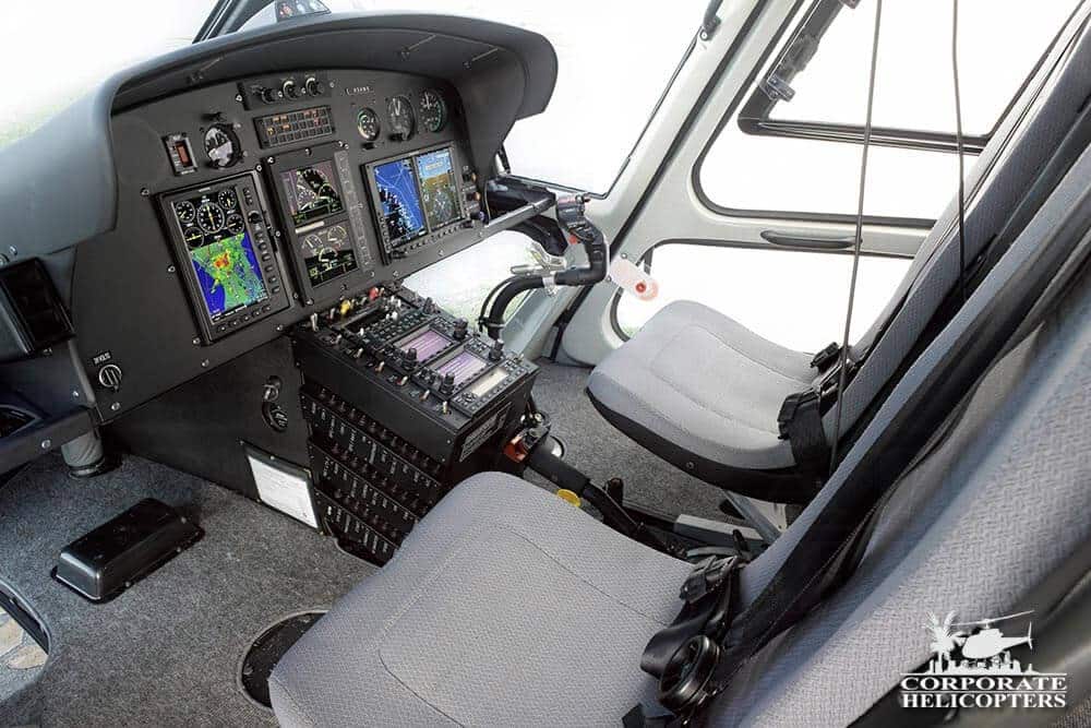 Front seats and flight controls for a 2011 Eurocopter AS350 B2 helicopter