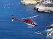 Helicopter flying over La Jolla Cove.