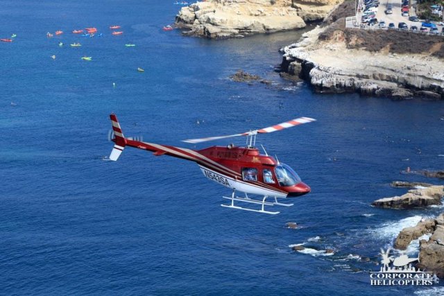 Helicopter flying over La Jolla Cove.