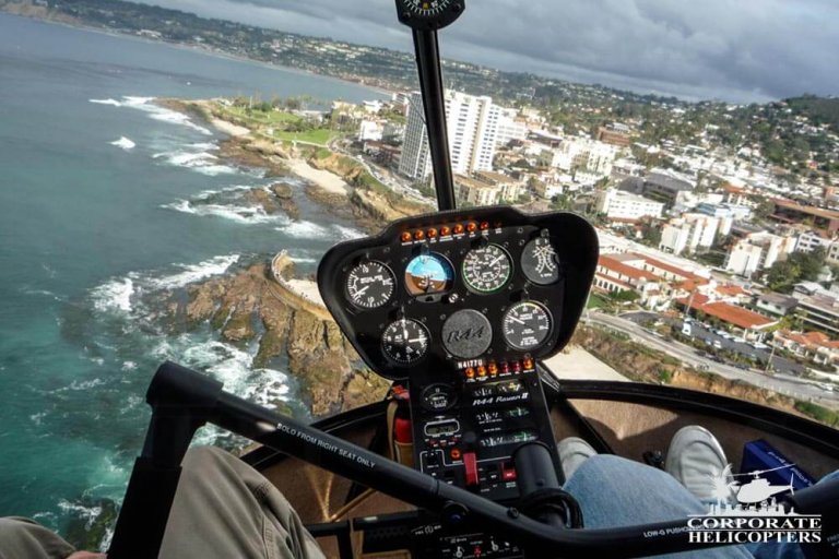 Helicopter flying over La Jolla coastline