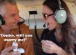 Man proposing to woman on helicopter flight. Text reads: Denise will you marry me?