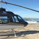 A helicopter landed on a Mexican beach