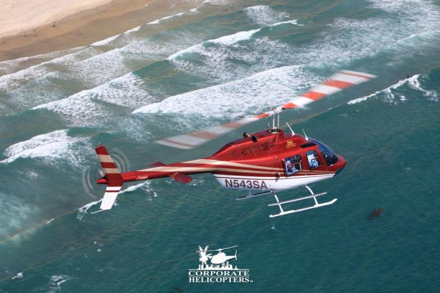san-diego-beach-helicopter-tour Helicopter flies above San Diego beach