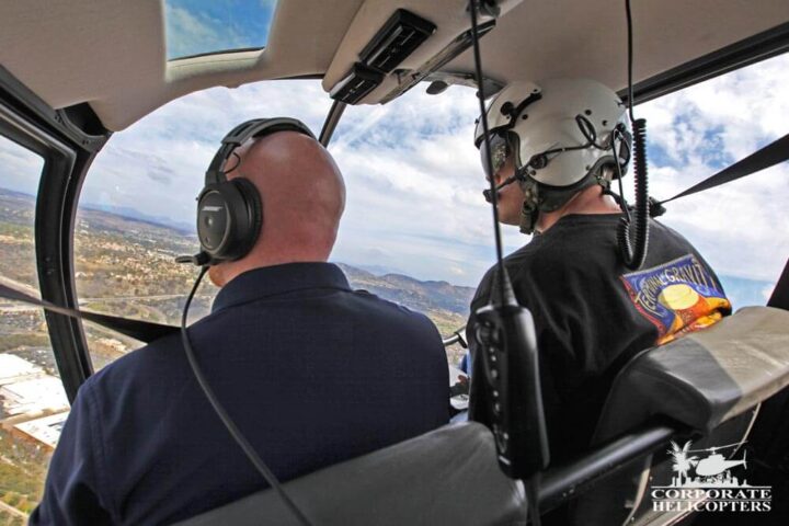 Helicopter pilot and instructor during flight