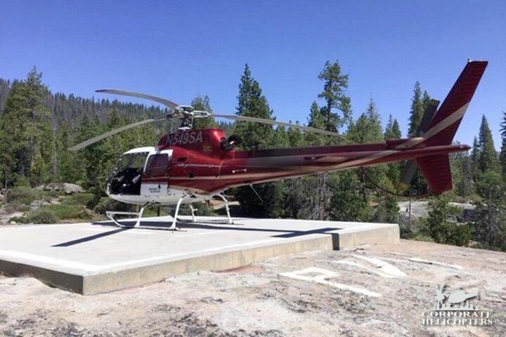 Helicopter landed on a helipad in the Sierra Nevada Mountains
