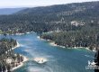 Aerial photo of mountain trees and a lake