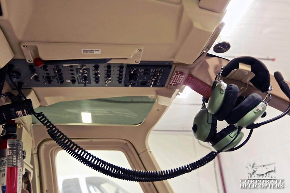 Avionics and controls on the ceiling of a 2000 Bell 206B III helicopter